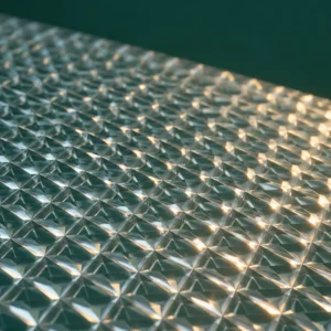 Prismatic polycarbonate surface concept with fine faceted texture